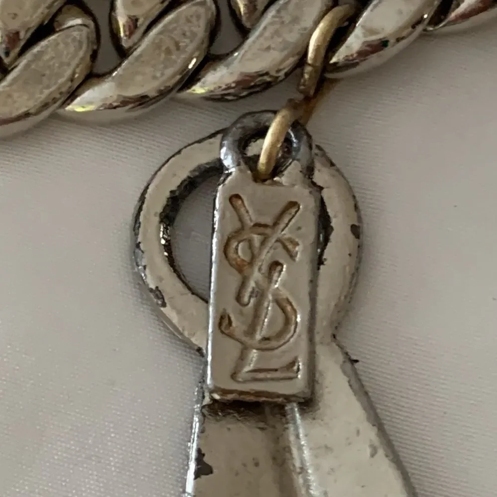 YSL silver chain link belt leaf design
